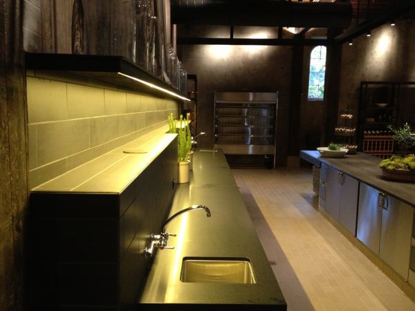 Metal Trim — Black magic patina applied to metal shelf at back wall of wine bar