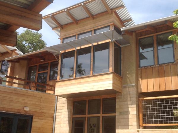 Sun Shade — Perforated stainless steel sun shades with hot dipped galvanized mounting brackets at a Healdsburg, Ca. home.