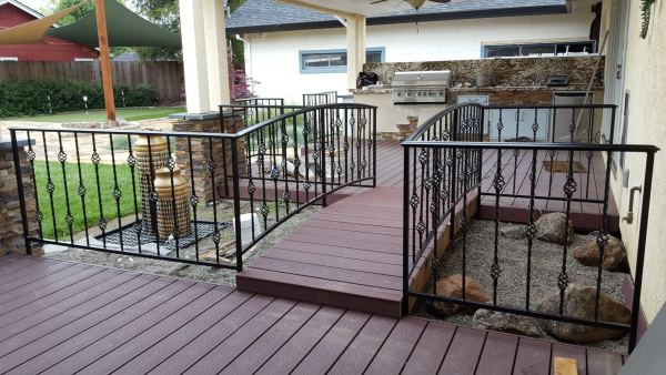 Backyard Railing System — Backyard railing system, featuring: 2 1/4" rail cap 1" x 1" x .120 tube steel posts 1/2" tightly twisted pickets with baskets BK08 black satin powder coat finish