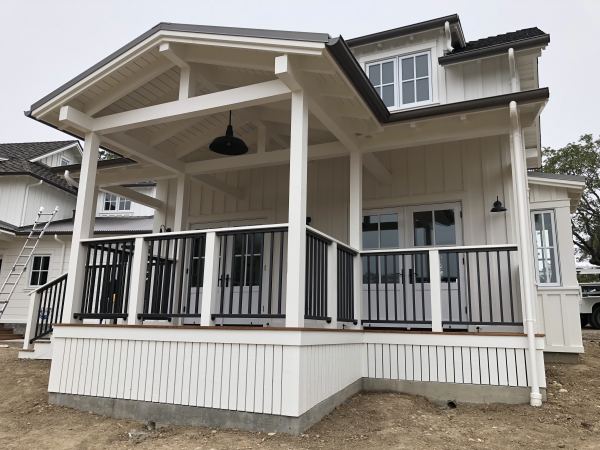 Classic Deck Railings — Classic style deck rails with 2 1/2" x 1 1/2" rectangle tube top and bottom with 1" x 1" square pickets powder coated in BK08 stain black