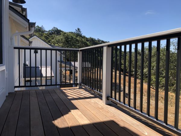 Classic Deck Railings — Classic style deck rails with 2 1/2" x 1 1/2" rectangle tube top and bottom with 1" x 1" square pickets powder coated in BK08 stain black
