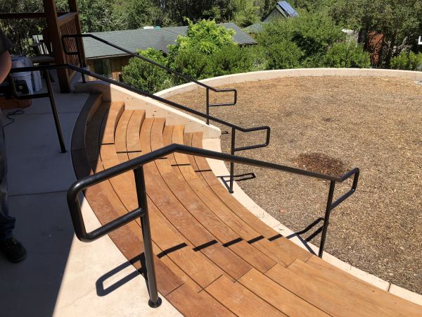 Round Handrails — Handrail constructed from 1 1/4" standard pipe (1 5/8" O.D.) and powder coated black