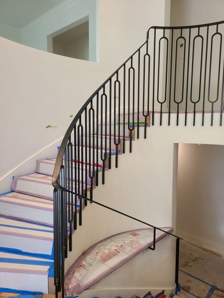 Modern Railing — Modern railing with custom made pickets and heat formed transitions powder coated satin black