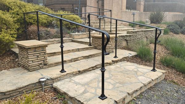 Exterior Handrail — Precision-fabricated exterior handrails built for performance, longevity, and visual clarity, featuring: 2 ¼” decorative molded rail cap mounted 34” -38” from stair tread noses ½” x 1 ½” flat bar underlayment 1” x 1” x ....